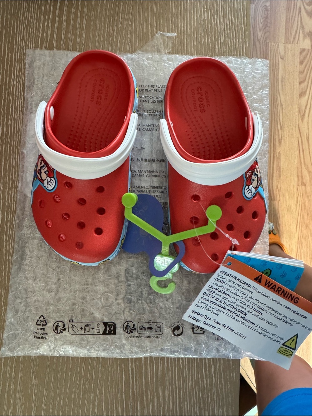 CROCS Red Kids Clogs with White Heel Strap and Blue Trim